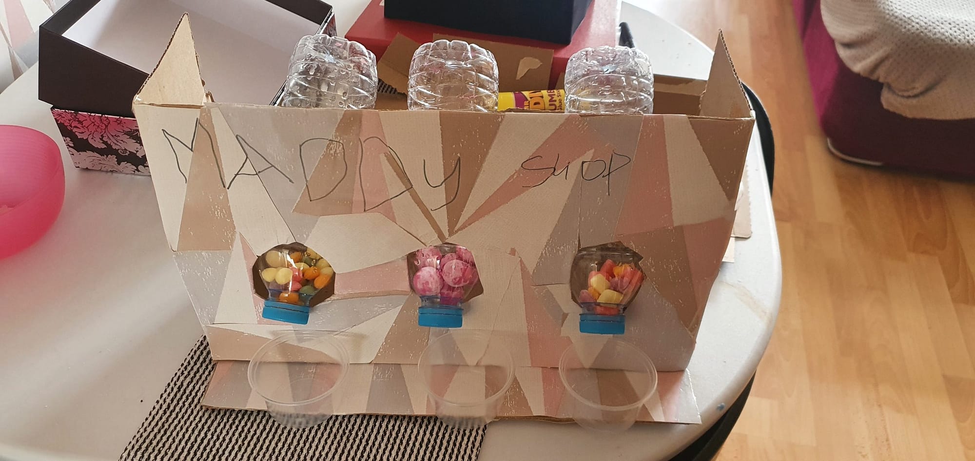 Sweet shop created from plastic bottles and cardboard