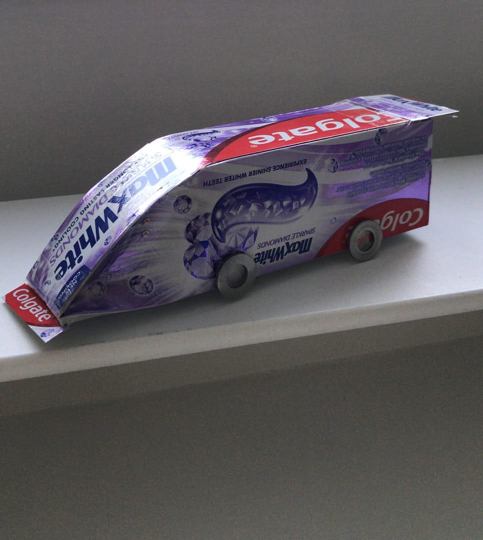 Toothpaste box turned into a race car